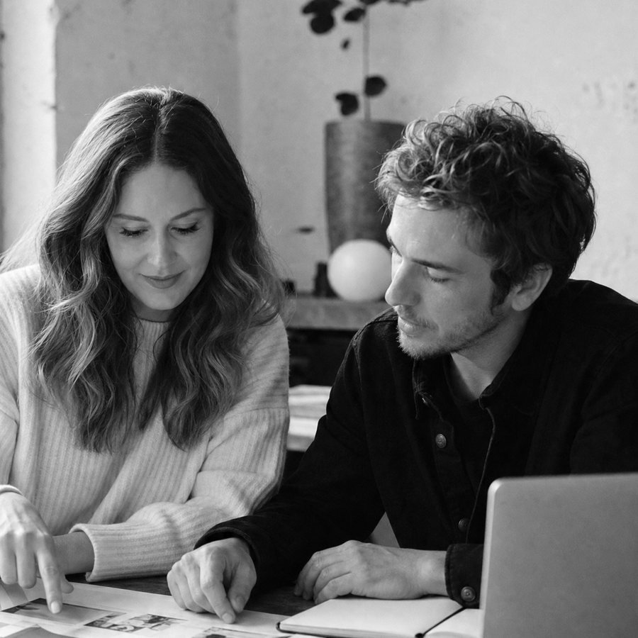 Christianna and Robert working at a table